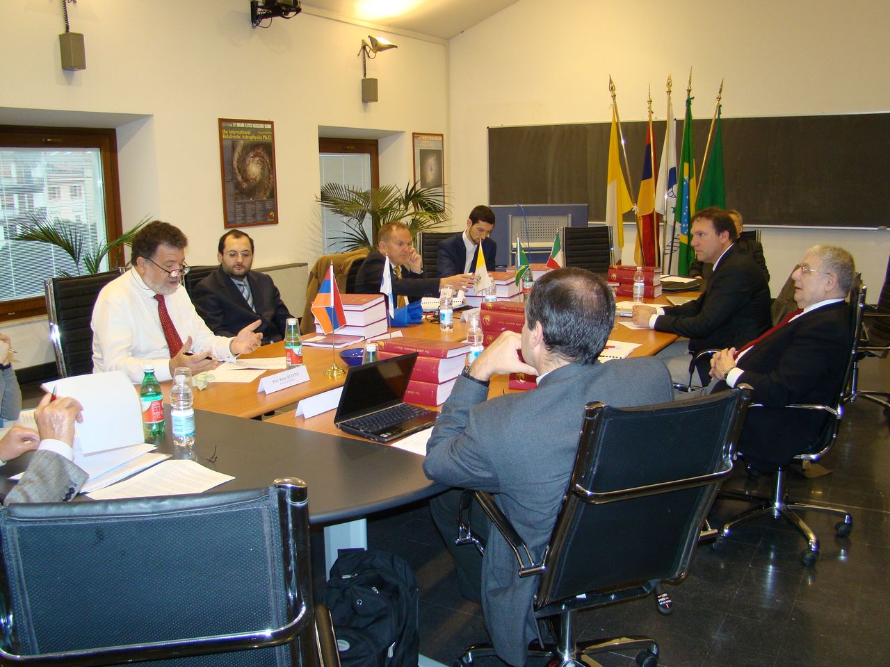 Representing the Specola Vaticana at the ICRANet board of directors meeting in
                                        2009. The rightmost person is Riccardo Giacconi, one of the fathers of X-ray
                                        astronomy.